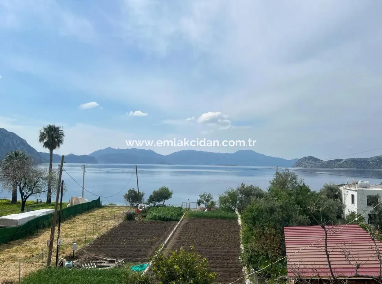 Einfamilienhaus Zum Verkauf Auf Einem 2000M2 Großen Grundstück Am Meer Im Viertel Marmaris Söğüt. Geeignet Zum Festbinden Eines Bootes Davor.