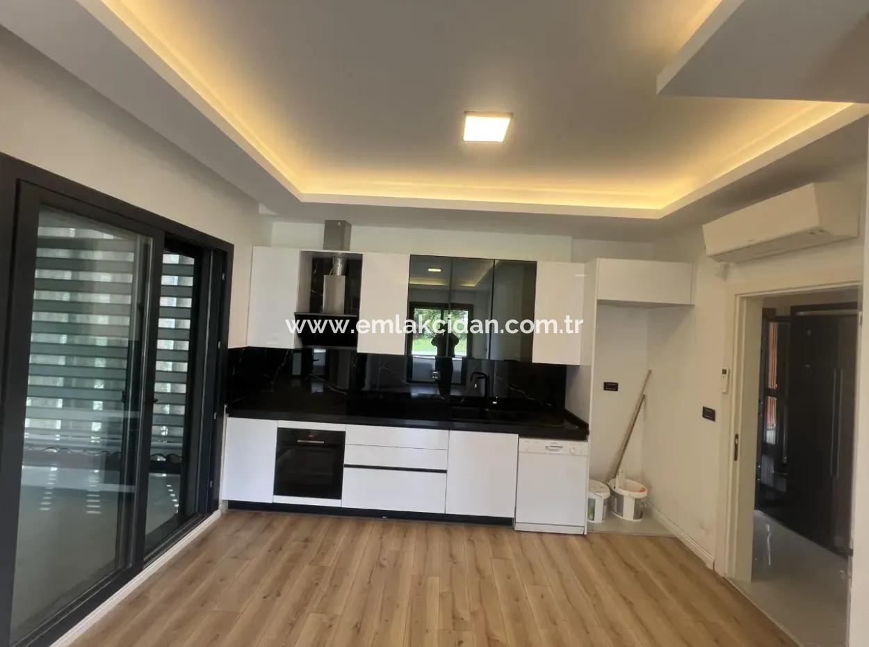 Luxury Apartment For Sale In A Stylish Complex In The Center Of Marmaris, With Ground Floor, Garden, 3 Rooms, 1 Living Room, Parking Lot