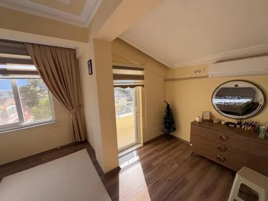 В районе Саріана 3+1 продажа Верхняя двухуровневая квартира