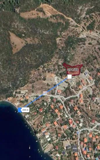Söğüt köyünde Simi adası ve deniz manzaralı ekolojik turizm İmarlı 2100 m2 tarla