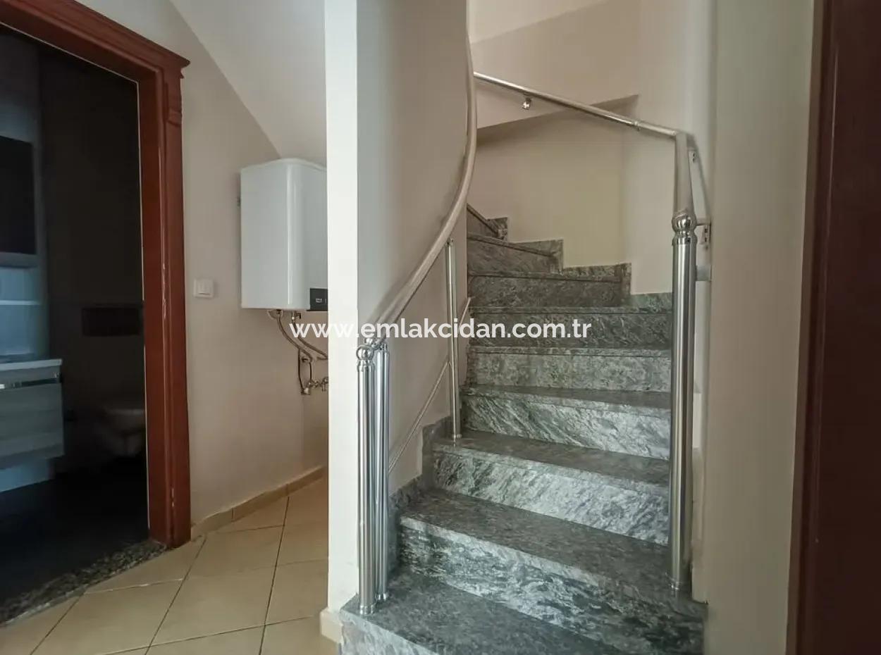 Marmaris İlçesi Beldibi Mahallesi Doğa Manzaralı Yüzme Havuzlu Site İçerisinde 3+1 Bahçe Dubleks Satılık Daire